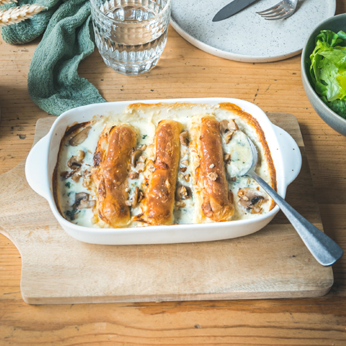 Gratin de quenelles nature au roquefort et champignons